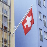 Facade mounting with flag flying out
