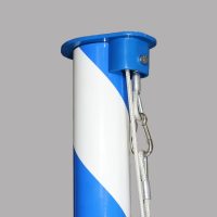 Pole top of the white-and-blue spiral-striped pole